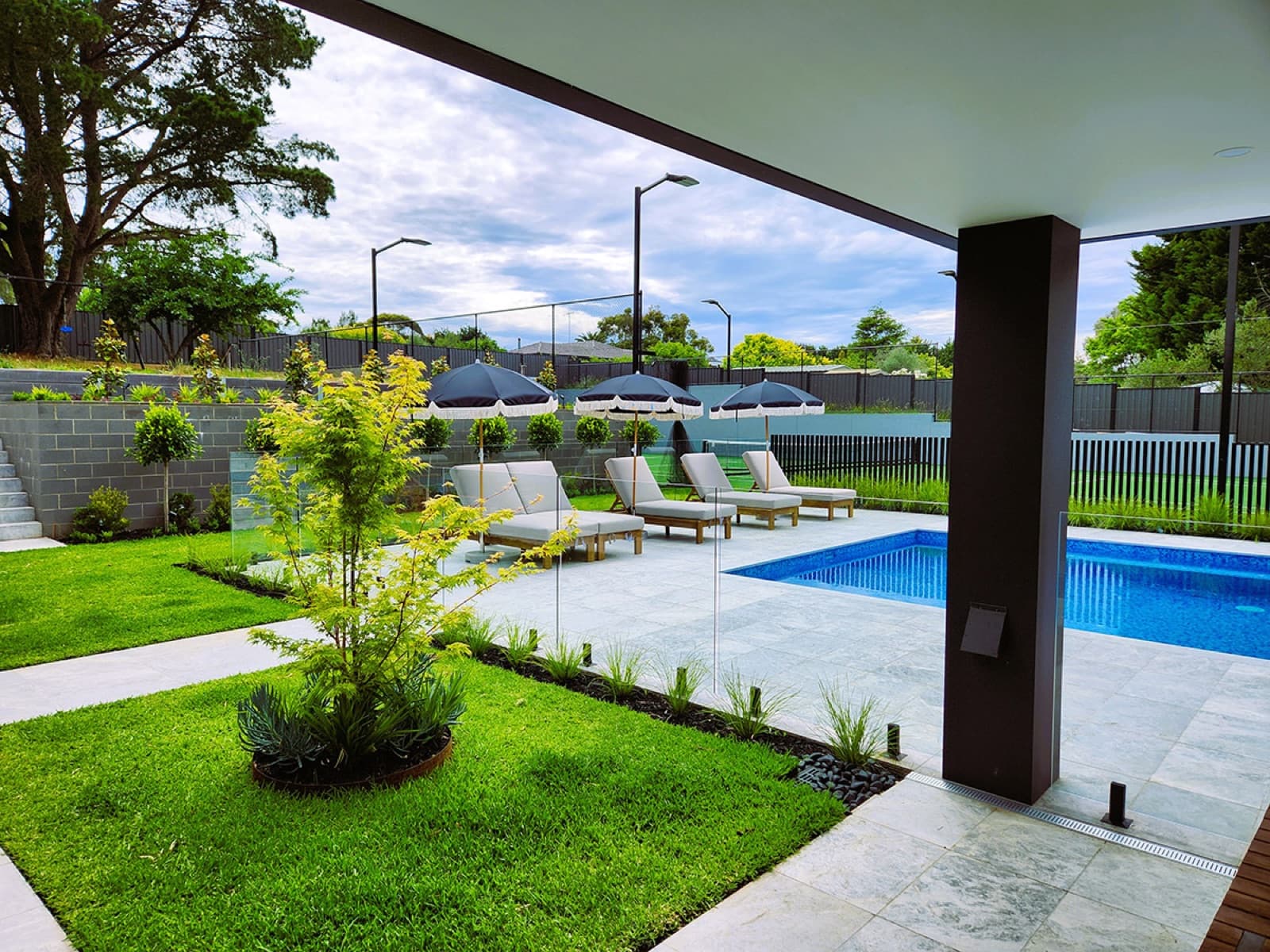 The view from the new living space out to the pool.